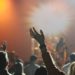 Hands in the air at a concert.